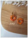 Xena marbré orangé unique