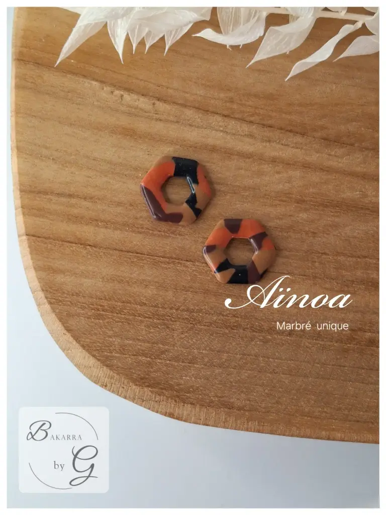 Aïnoa - Marbré unique Noir Marron orangé